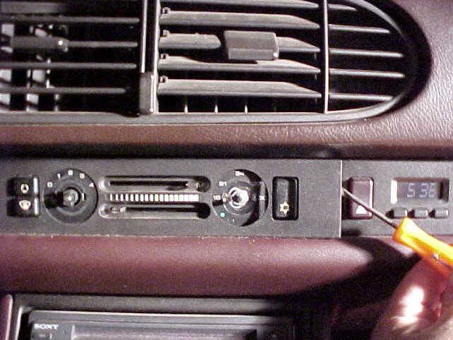 Clock and Temperature Control Unit Removal and Replacement