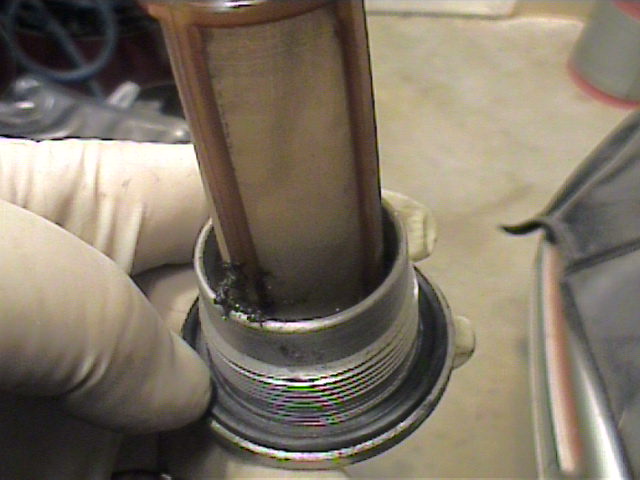 Fuel Pump Suction Strainer - Removing, Cleaning, and Replacing